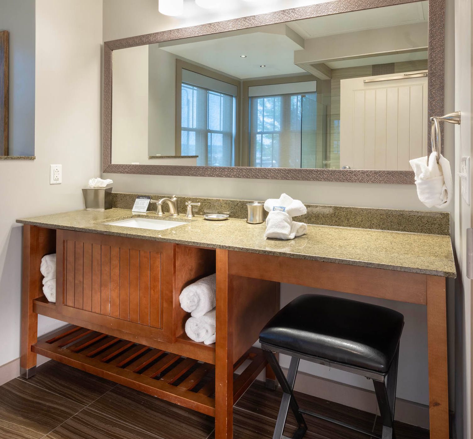 Bathroom with seating area at The Chautauqua Harbor Hotel